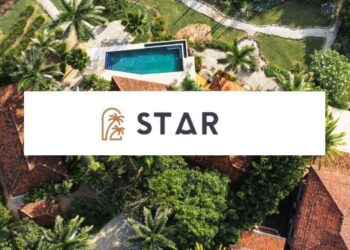 Aerial view of Santa Teresa coastline with jungle, ocean, and homes illustrating real estate development in harmony with nature