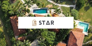 Aerial view of Santa Teresa coastline with jungle, ocean, and homes illustrating real estate development in harmony with nature