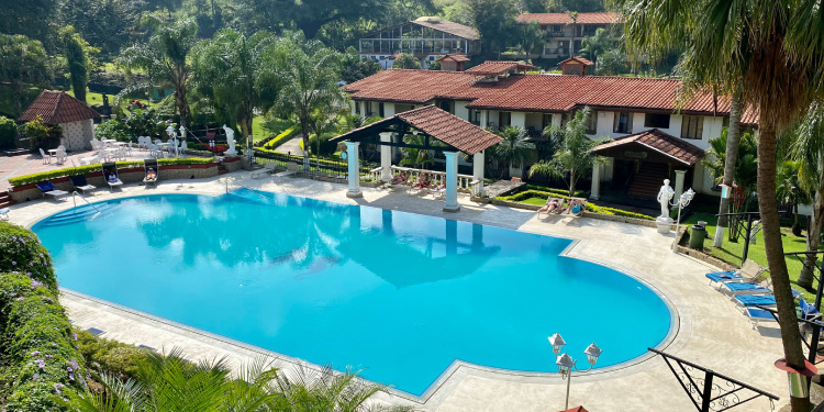 Dan Chaput standing on a tropical property in Santa Teresa, Costa Rica, representing Costa Private Loans' personalized financing services for real estate and business projects.
