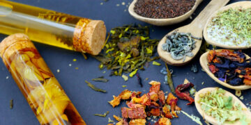 Display of traditional Chinese medicine herbs and essential oils used for natural healing and balance