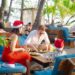 Family enjoying the holiday season at Banana Beach in Santa Teresa, Costa Rica