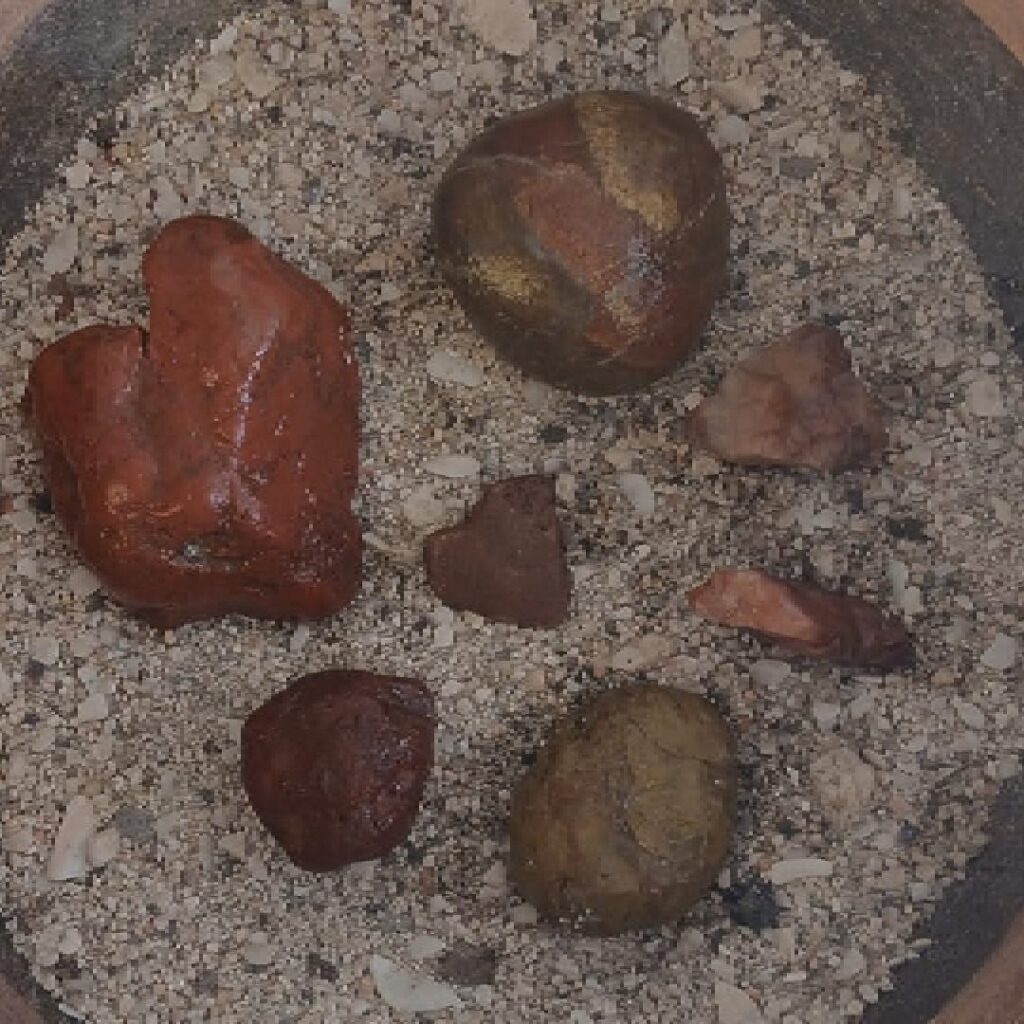 Red Jasper After Rain
Iron-rich volcanic stone revealed when the land exhales.