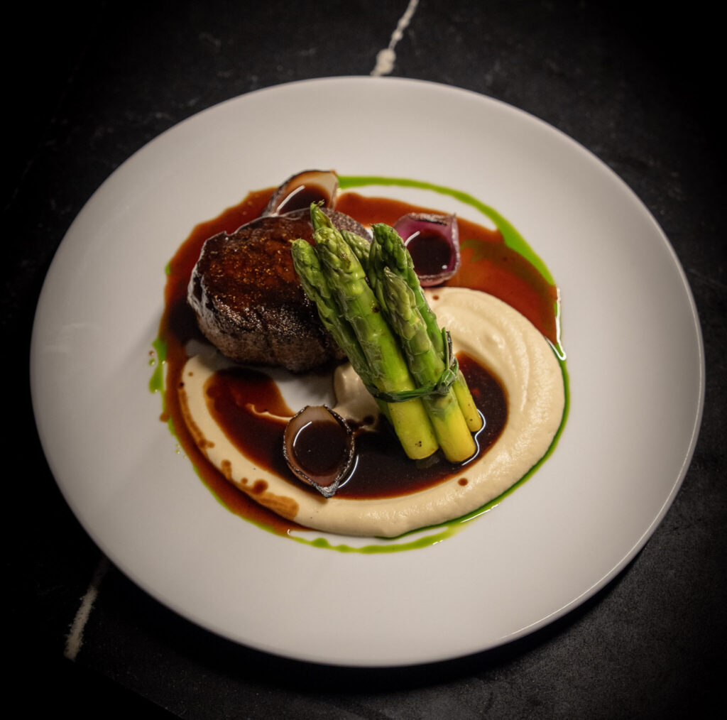 Beef tenderloin with asparagus served at Santa Teresa Costa Rica restaurant