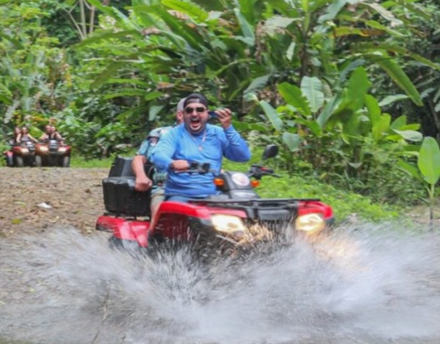 ATV tour through jungle trails and water crossings near Santa Teresa Costa Rica