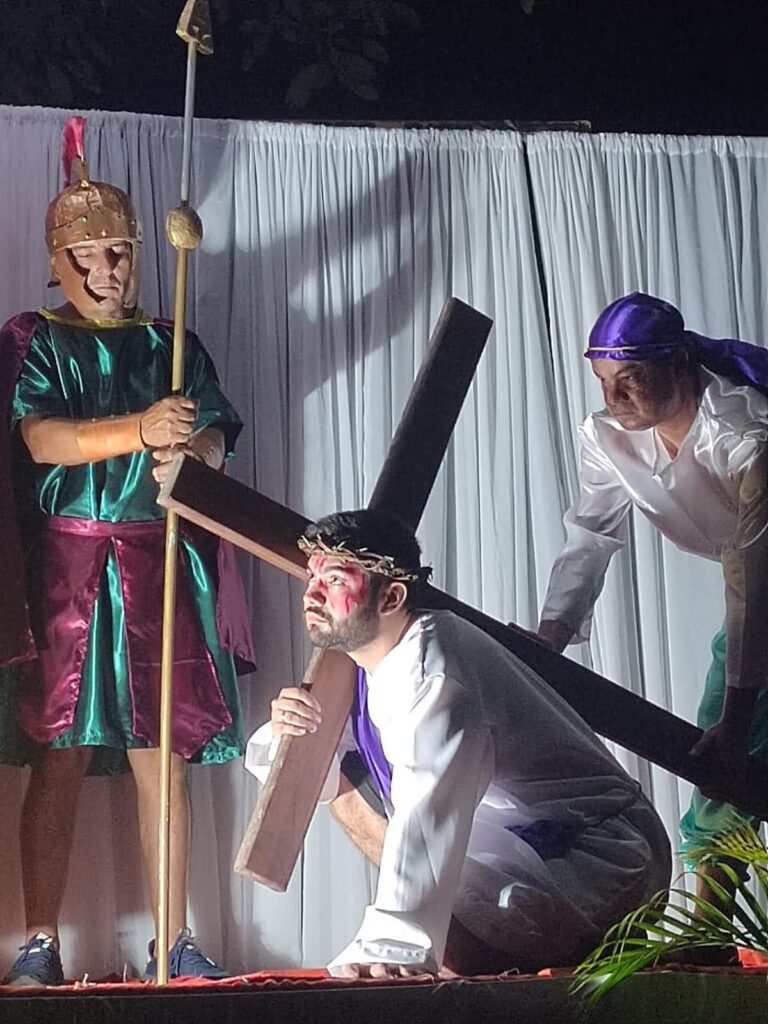 Local residents reenacting a station of the Via Crucis during Semana Santa in Santa Teresa Costa Rica
