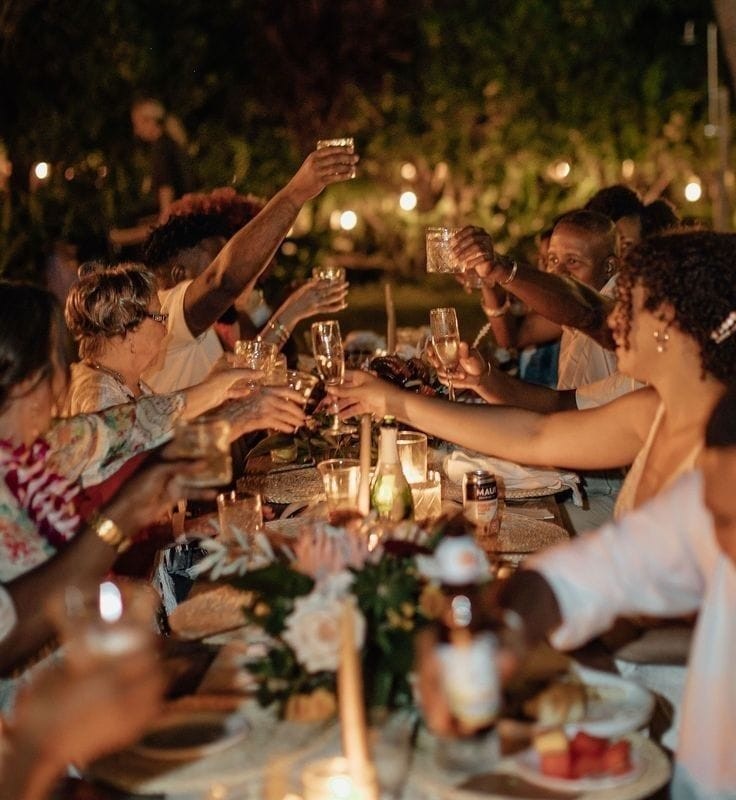 Passover Seder dinner at Banana Beach Santa Teresa Costa Rica with long table gathering by the ocean