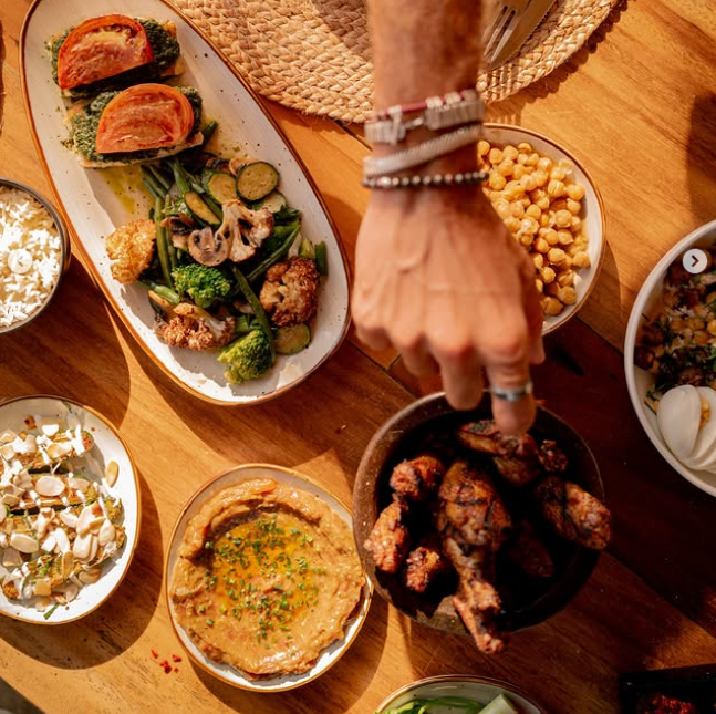 Sunset beachfront dining table at Uma restaurant in Santa Teresa Costa Rica
