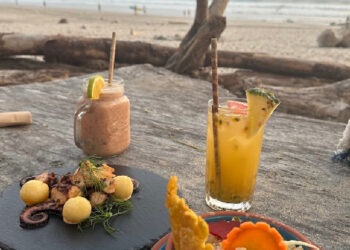 A calm beachfront table serving elevated Costa Rican classics, fresh seafood, and farm-to-table flavors in a truly tico setting.