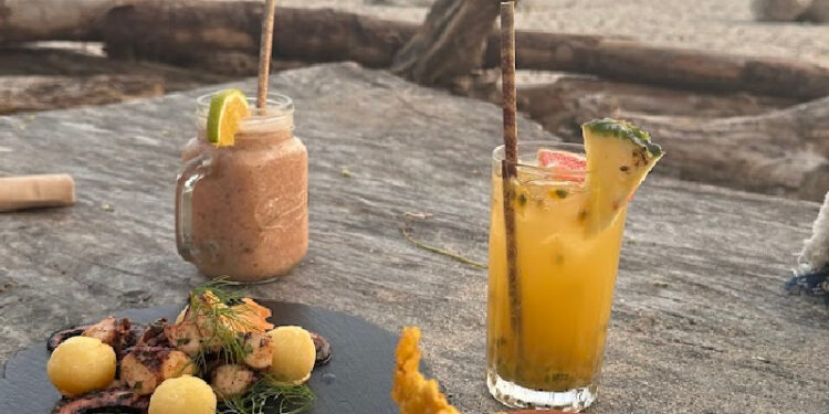 A calm beachfront table serving elevated Costa Rican classics, fresh seafood, and farm-to-table flavors in a truly tico setting.