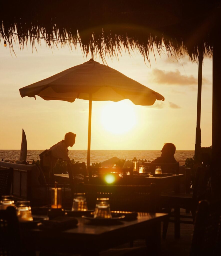 Romantic sunset dinner table on the beach Santa Teresa Costa Rica.