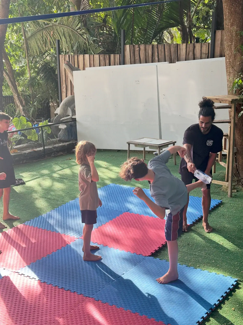 Children playing during Creativo art and music camp in Santa Teresa Costa Rica, safe educational creative environment with art, music, movement and outdoor activities.