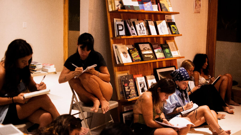Participants attending a weekly writing workshop at Agora Gallery in Santa Teresa, Costa Rica.