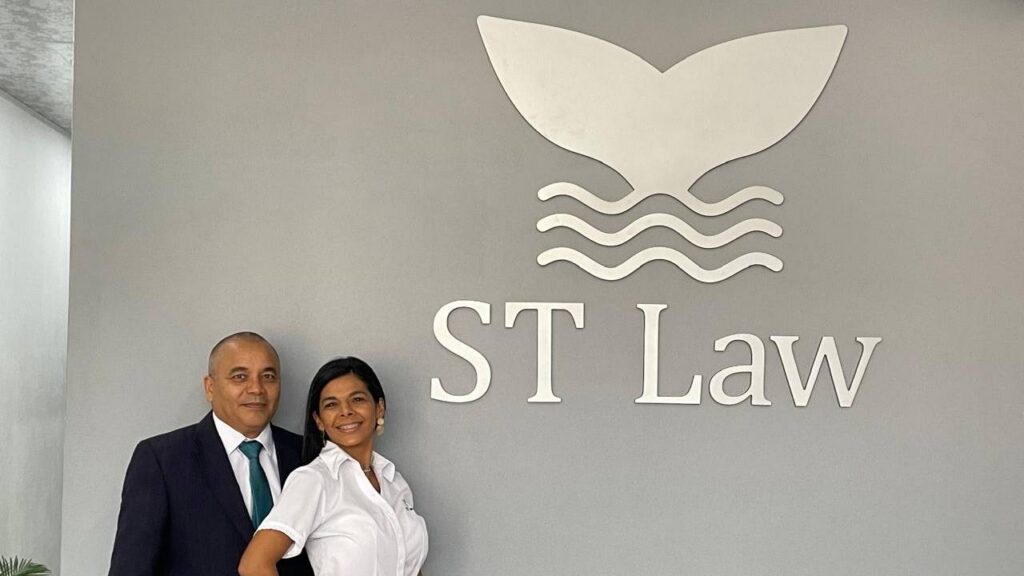 Alan and Melissa standing proudly in front of the ST Law building in Santa Teresa, Costa Rica.